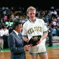 Larry Bird of the Boston Celtics receives an award after a game circa 1985 at the Boston Garden in Boston, Massachusetts. NOTE TO USER: User...