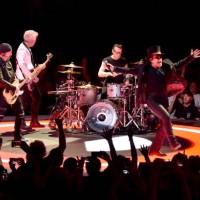 Larry Mullen Jr., The Edge, Bono and Adam Clayton of U2 perform on stage during the 