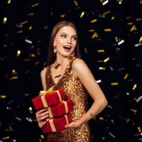 laughing girl with falling confetti - fashion stock pictures, royalty-free photos & images