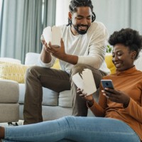 lazy day at home and ordering food online - junk food stock pictures, royalty-free photos & images