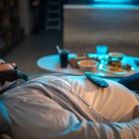 lazy man fell asleep in living room - junk food stock pictures, royalty-free photos & images