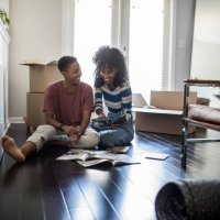 lesbian couple picking paint colors for new home - home decoration stock pictures, royalty-free photos & images