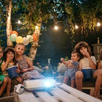 let's watch our favorite cartoon! - garden decoration stockfoto's en -beelden