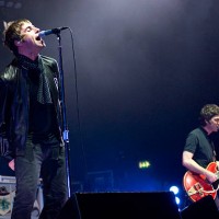 Liam Gallagher and Noel Gallagher of English rock band Oasis, live on stage at the Wembley Arena, October 16, 2008.