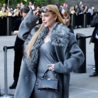 Lindsay Lohan attends the Michael Kors S/S 2025 fashion show during New York Fashion Week at The Shed on September 10, 2024 in New York City.