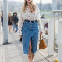 Lisa Aiken wearing a white blouse, denim skirt, sandals outside Ten Pieces at day 5 during Mercedes-Benz Fashion Week Resort 18 Collections at...