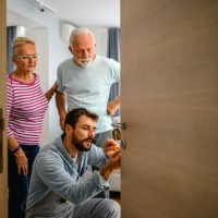 locksmith working with house door lock using screwdriver - home decoration stock pictures, royalty-free photos & images