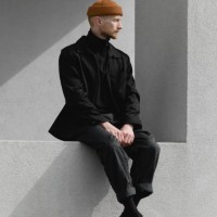 lonely stylish young man on the windowsill - fashion stock pictures, royalty-free photos & images