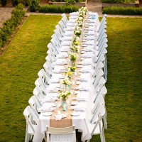 long elegantly set white table, outdoors - garden decoration stock pictures, royalty-free photos & images