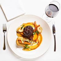 looking down at delicious steak meal served with red wine - food stock pictures, royalty-free photos & images