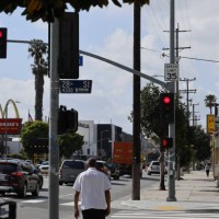 Los Angeles, CA A view of fast food restaurants on Crenshaw Blvd including Taco Bell, McDonald's, Yoshinoya, Subway, El Pollo Loco, Little Caesers,...