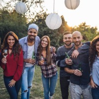 lovely group of young people enjoying a party - garden decoration stock pictures, royalty-free photos & images