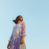 low angle view of woman standing against clear sky,india - fashion photos et images de collection