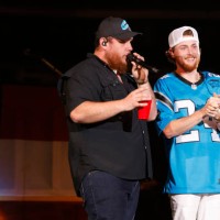 Luke Combs and Bailey Zimmerman perform onstage at the Concert For Carolina Benefit Concert at Bank of America Stadium on October 26, 2024 in...