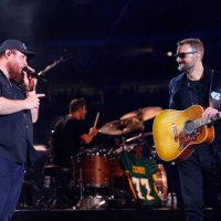 Luke Combs and Eric Church perform onstage at the Concert For Carolina Benefit Concert at Bank of America Stadium on October 26, 2024 in Charlotte,...