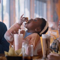 lunch, black family and eating food in in restaurant with smile, fun and hungry kids at table. milkshake, mother and children in cafe sharing meal with burger, drinks or bonding on weekend in africa - junk food stock pictures