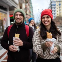 lunch time on the move - junk food stock pictures, royalty-free photos & images