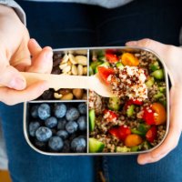 lunchbox with quinoa salad with tomato and cucumber, blue berry and trail mix - food stock pictures, royalty-free photos & images