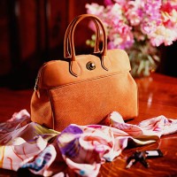 luxury hand bag on table - fashion stock pictures, royalty-free photos & images