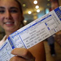 Madonna fan holds a cherished ticket prior to Madonna''s concert July 25, 2001 at Madison Square Garden in New York City.