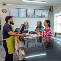 making an order at a takeaway - junk food stock pictures, royalty-free photos & images