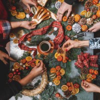 making christmas door wreath with equipments in decorator's workplace - home decoration stock pictures, royalty-free photos & images