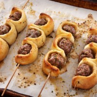 making the viral baked meatball sub on a stick - junk food stock pictures, royalty-free photos & images