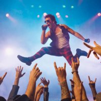 male rock star performing in front of audience - concert stock pictures, royalty-free photos & images