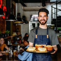 male waiter with tray of snacks at buenos aires restaurant - food stock pictures, royalty-free photos & images