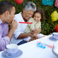 man blowing an extending whistle - garden decoration stock pictures, royalty-free photos & images