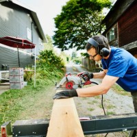 man cutting lumber for home improvement project - home decoration stock pictures, royalty-free photos & images