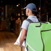 man delivering food - junk food stock pictures, royalty-free photos & images