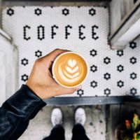 man drinking coffee at the coffee shop, personal perspective view - junk food stock pictures, royalty-free photos & images