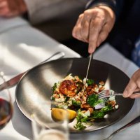 man eating freshly prepared meal in restaurant - food stock pictures, royalty-free photos & images