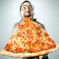 man eating oversized pizza slice - junk food stock pictures, royalty-free photos & images