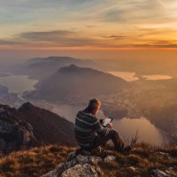man hiker solo on the mountain during golden hour - travel stock pictures, royalty-free photos & images