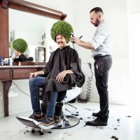 man in a barber shop - hairstyle stock pictures, royalty-free photos & images