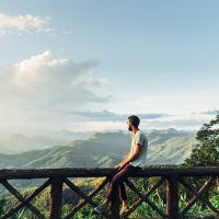 man in mountains at sunset in thailand - travel stock pictures, royalty-free photos & images