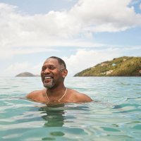 man in ocean - travel stock pictures, royalty-free photos & images