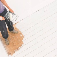 man painted into corner - home decoration stockfoto's en -beelden