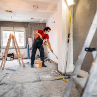 man painting apartment walls - home decoration stock pictures, royalty-free photos & images