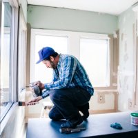 man painting interior window sill at home - home decoration stock pictures, royalty-free photos & images