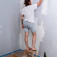 man painting walls at home - home decoration stock pictures, royalty-free photos & images