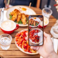 man photographing his breakfast at the cafe using smartphone, personal perspective view - food stock pictures, royalty-free photos & images