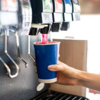 man pours a fizzy drink.sparkling water.cool ice soft drink cola - junk food stock pictures, royalty-free photos & images