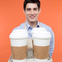 man serving takeout coffee - junk food stock pictures, royalty-free photos & images