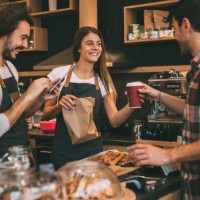 man taking his order at a coffee shop - food stock pictures, royalty-free photos & images