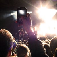 man taking picture at concert - concert stock pictures, royalty-free photos & images