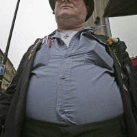 Man walks through Bradford city centre as it is declared the fattest town in Great Britain on February 1 Bradford, England. A study by Men's Fitness...