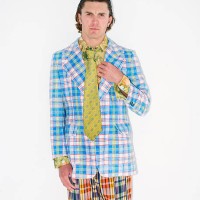 man wearing 1980s plaid jacket and pants - fashion stock pictures, royalty-free photos & images